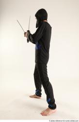 Man Young Athletic Fighting with sword Standing poses Casual Asian